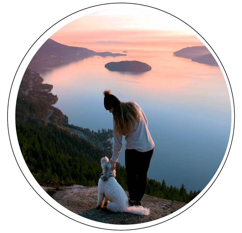Woman with Dog at Sunset